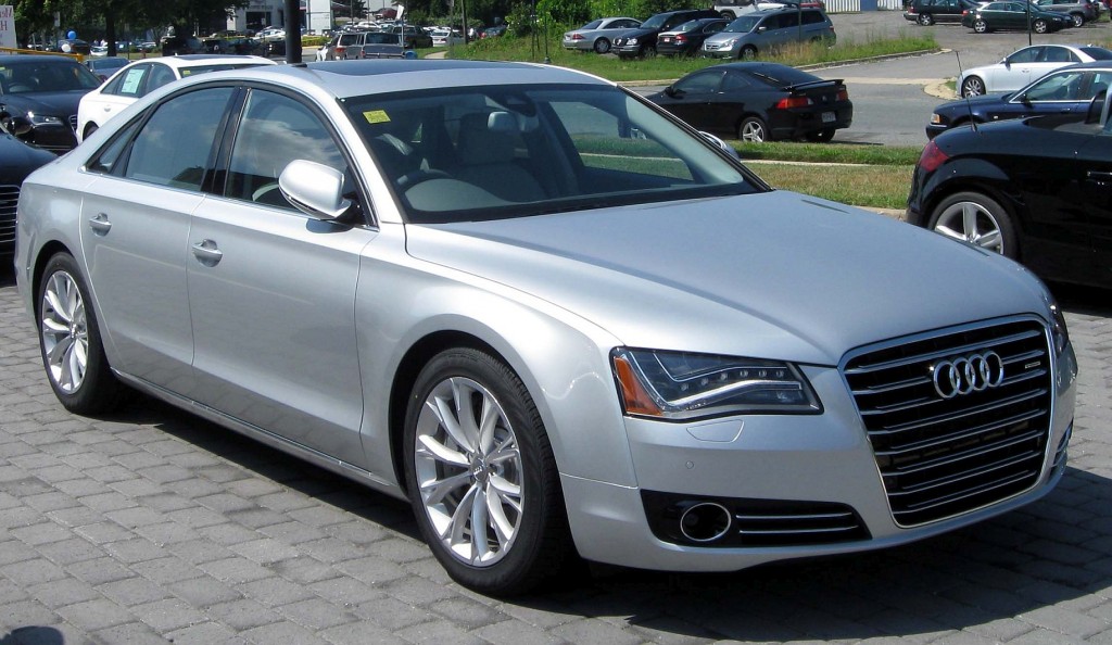 metallic silver 2011 Audi A8 in parking lot