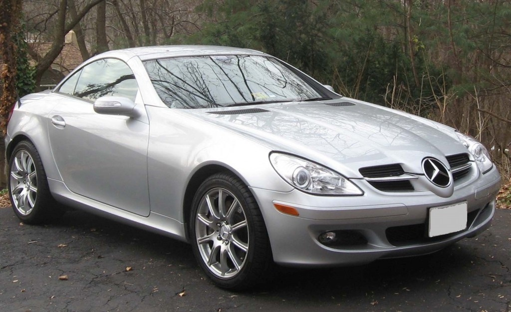 metallic silver mercedes-benz slk R171 on wooded driveway